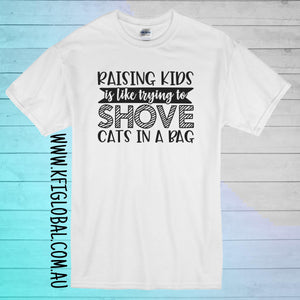 Raising Kids is like trying to shove cats in a bag Design