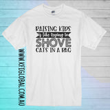 Raising Kids is like trying to shove cats in a bag Design